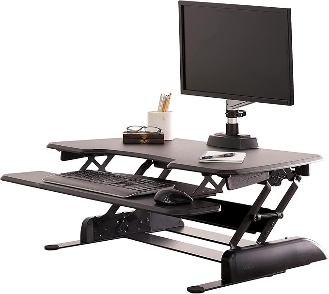 Picture link of standing desk converter for work surface.